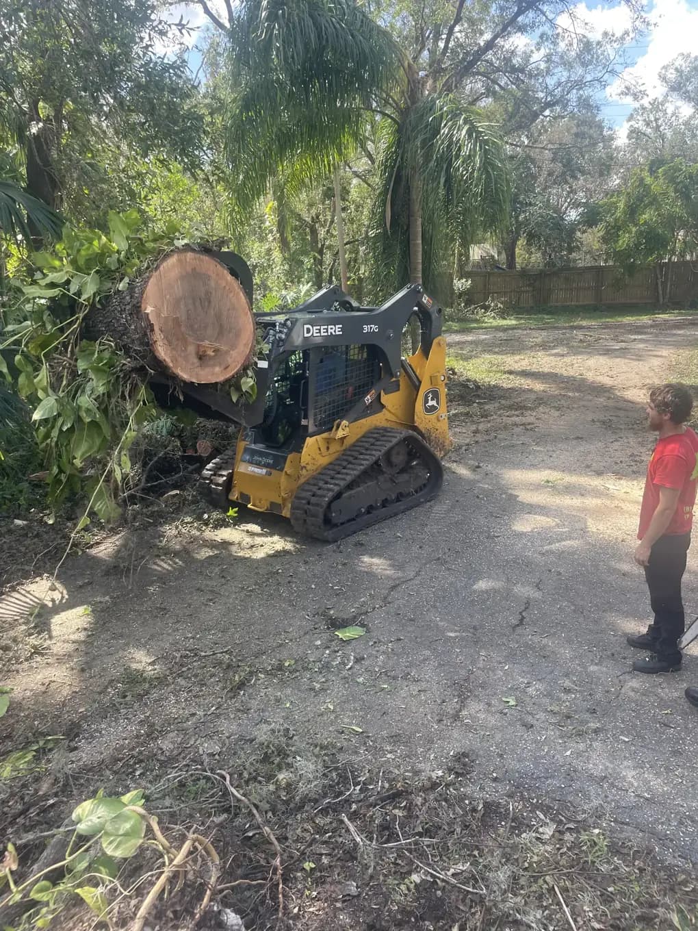 Skid steer mulch install, Southwest Florida, by Blue Collar Q